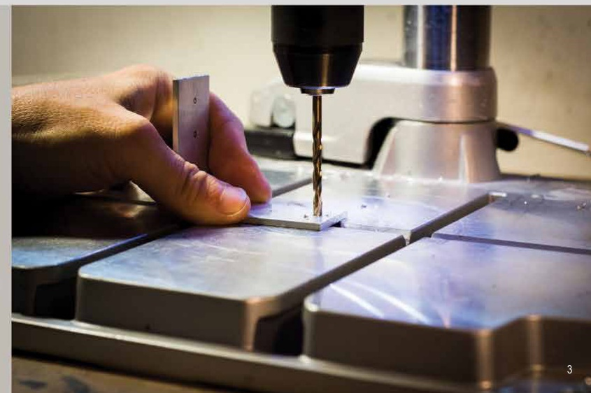 Drilling an aluminum profile in the workshop